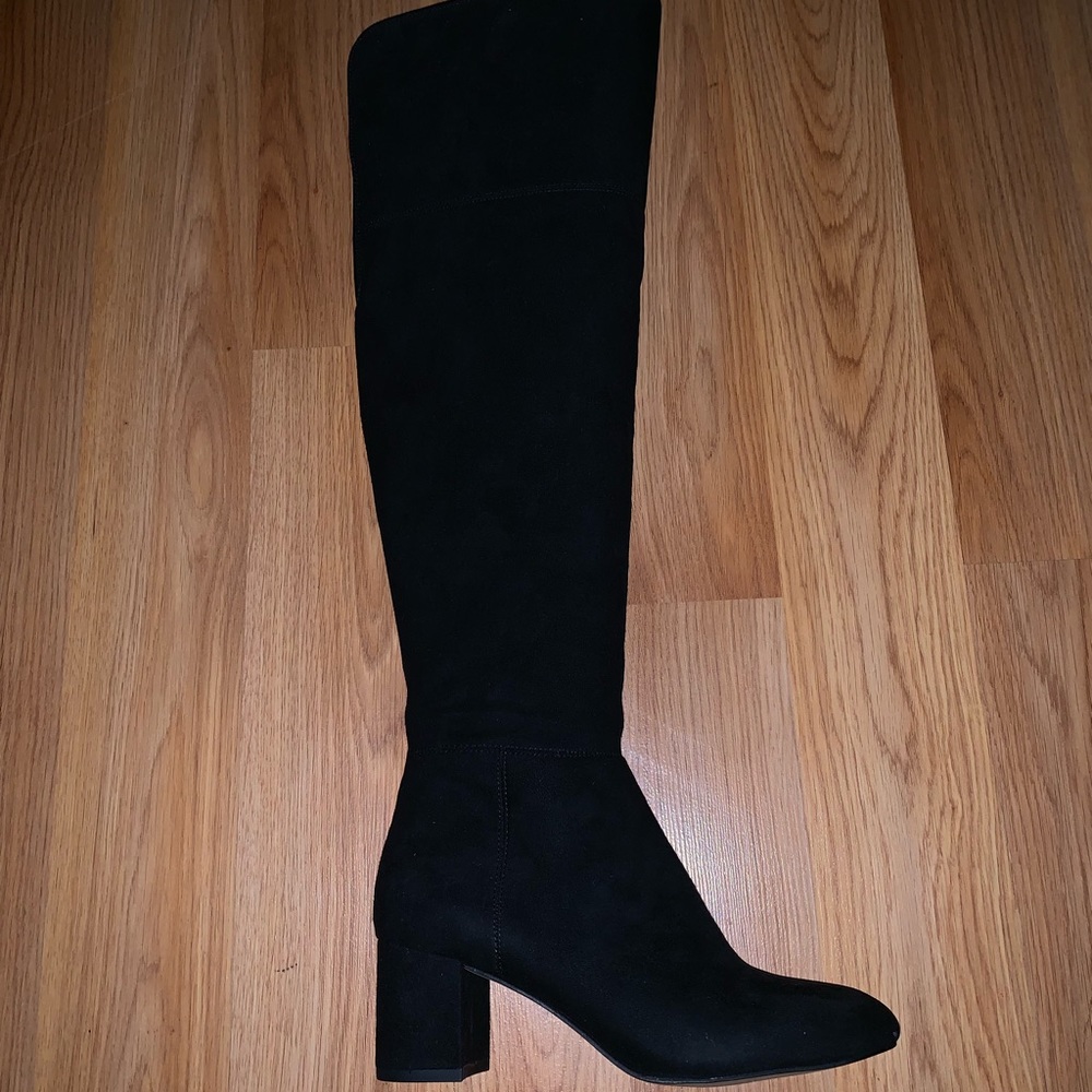 High suede black boots .